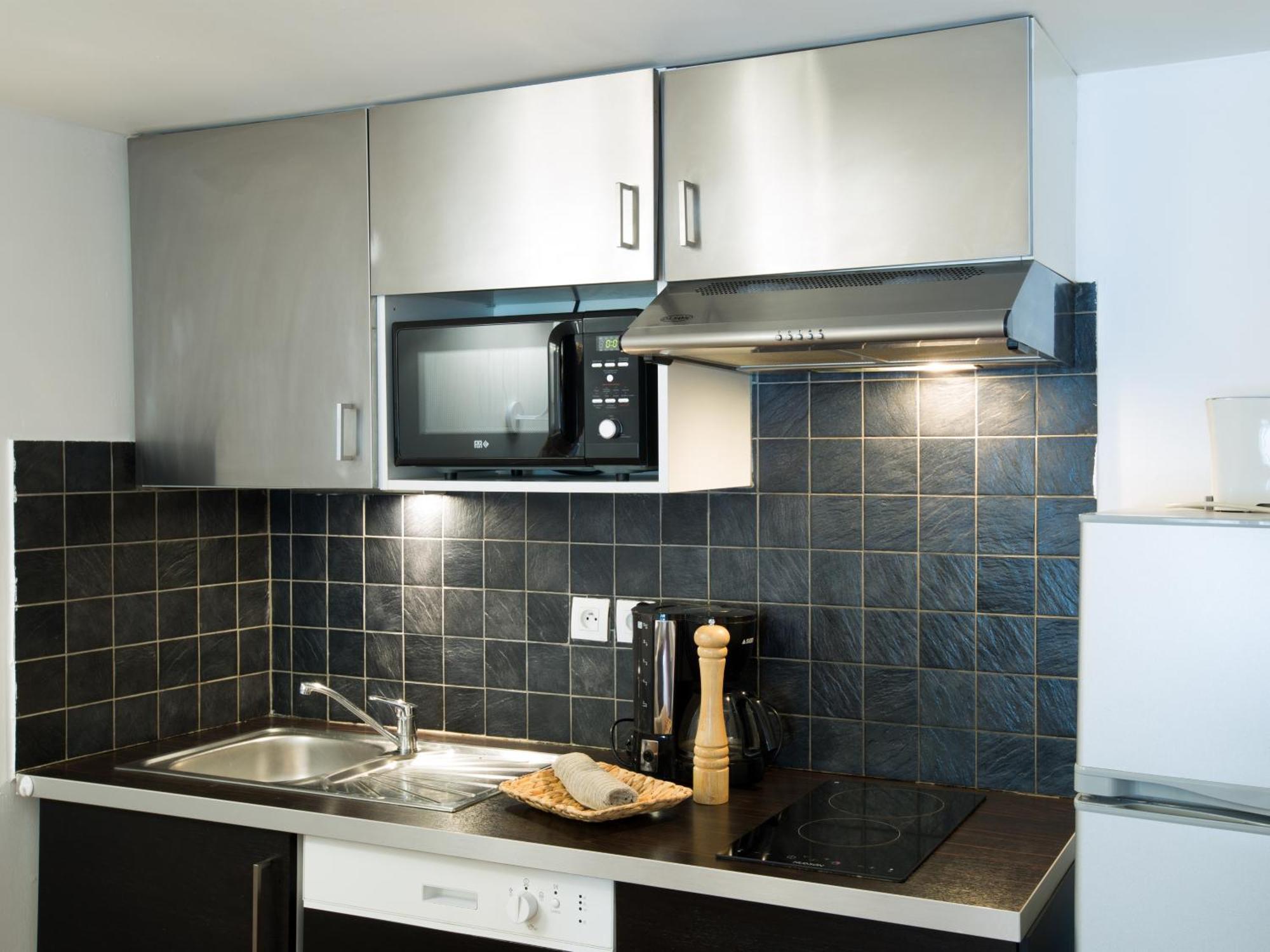 เล เคล่ เดอ ลา ซิตี้ Apartment การ์กาซอน ห้อง รูปภาพ